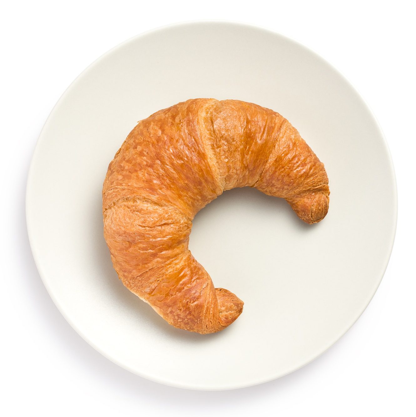 fresh croissant on plate